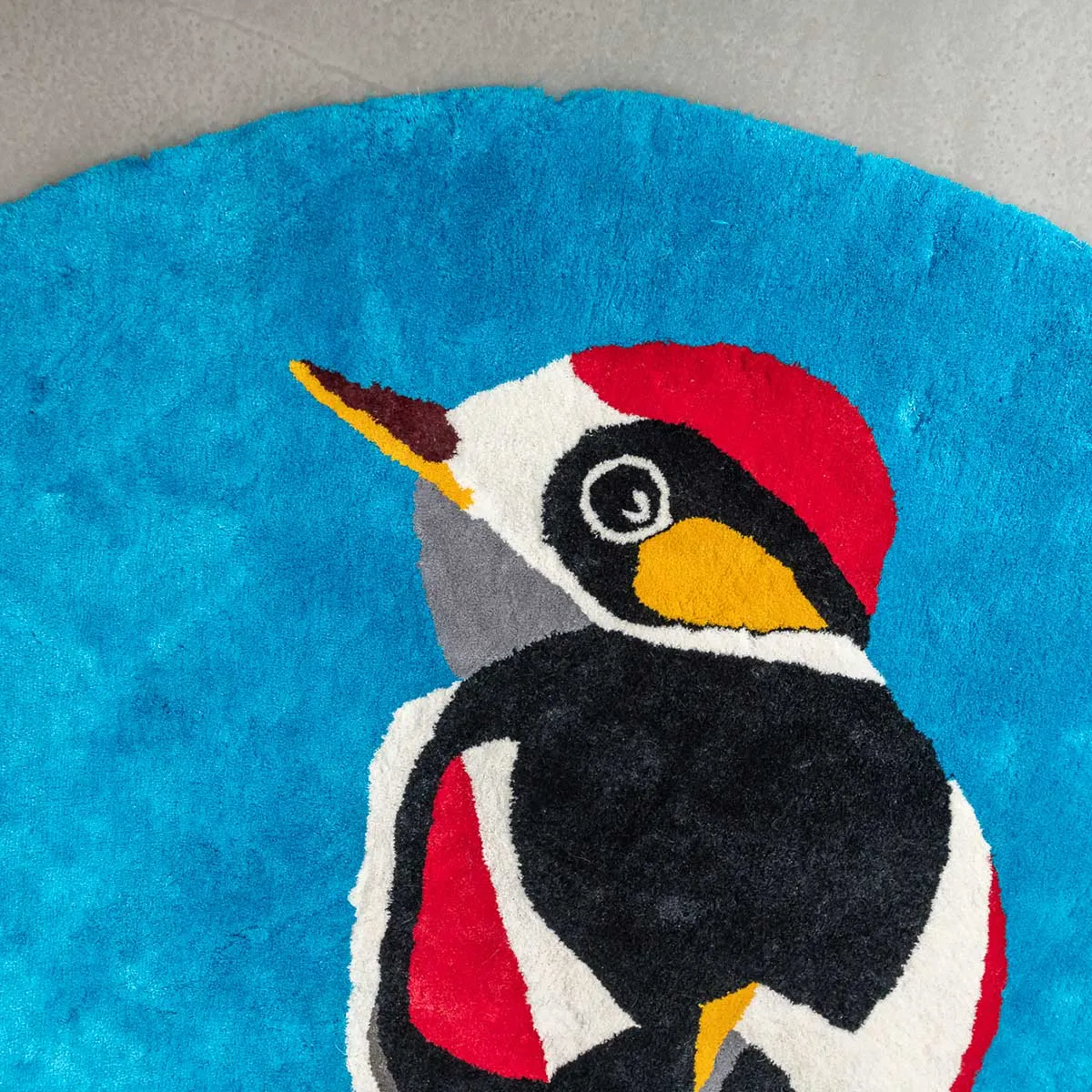 WOODPECKER hand-woven linen rug by Agne Kisonaite
