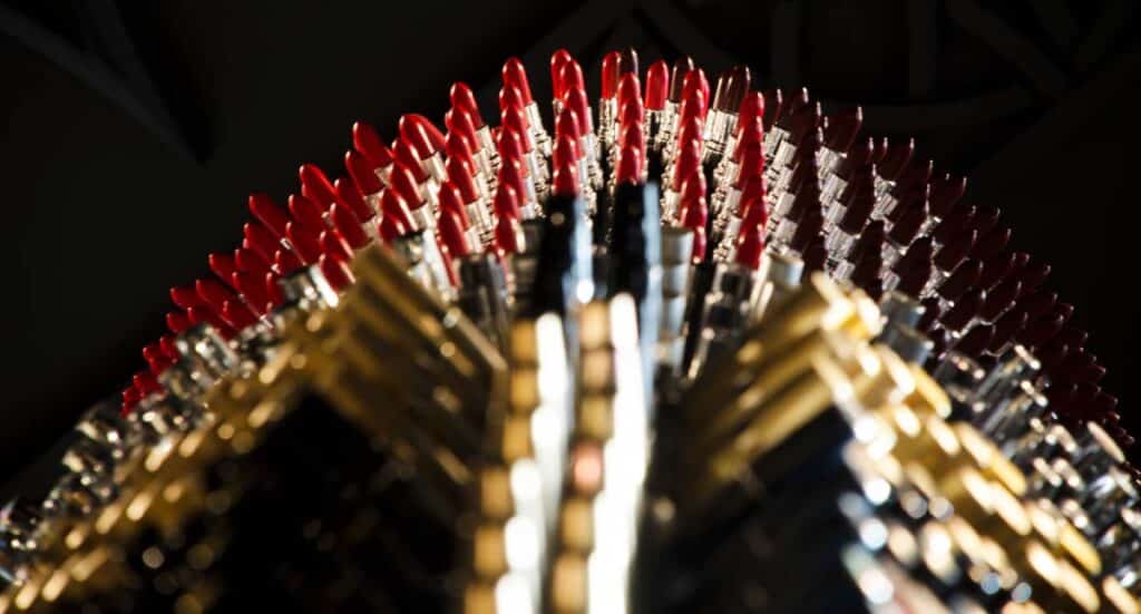 Red lipstick sculpture detail from the Giant Lipstick waste art project by Agne Kišonaitė.