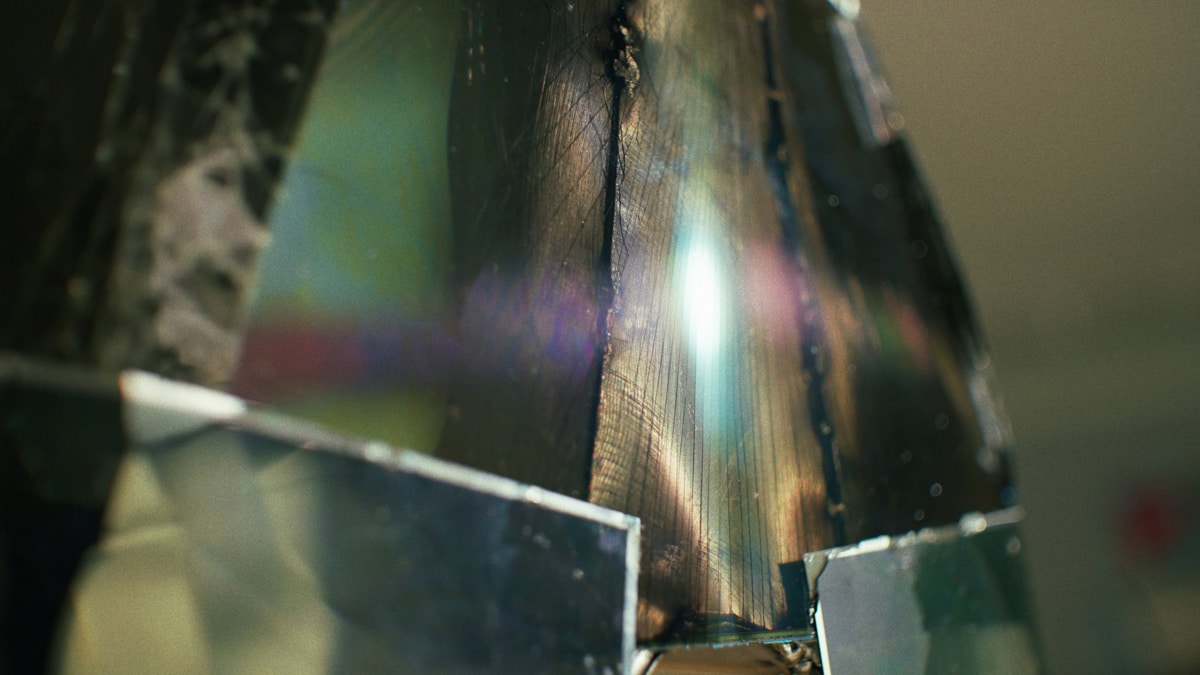 Close-up of the reflective metal surface used in the Adolescence art installation by Agne Kisonaite